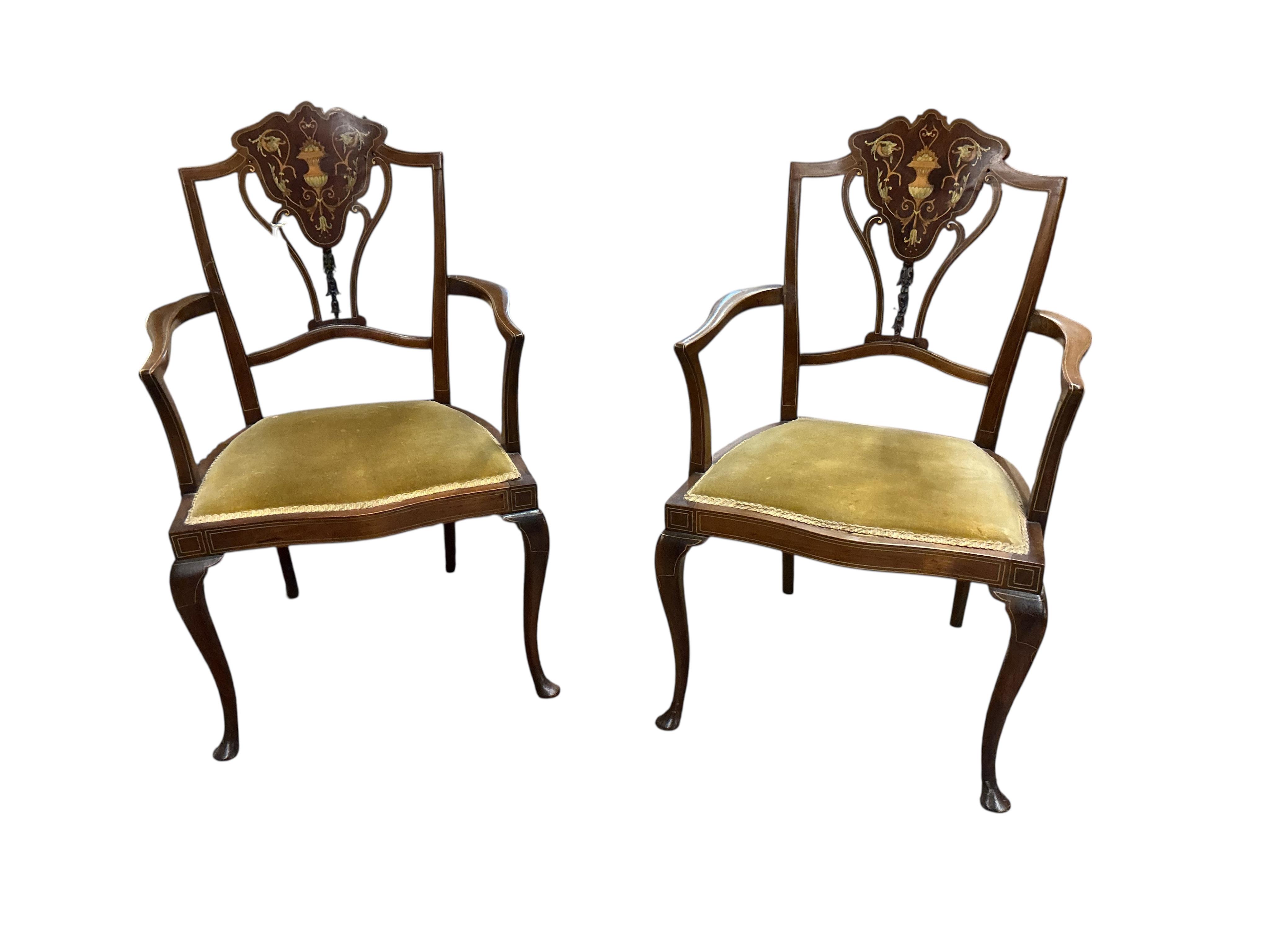 A set of eight Edwardian marquetry inlaid mahogany dining chairs, two with arms